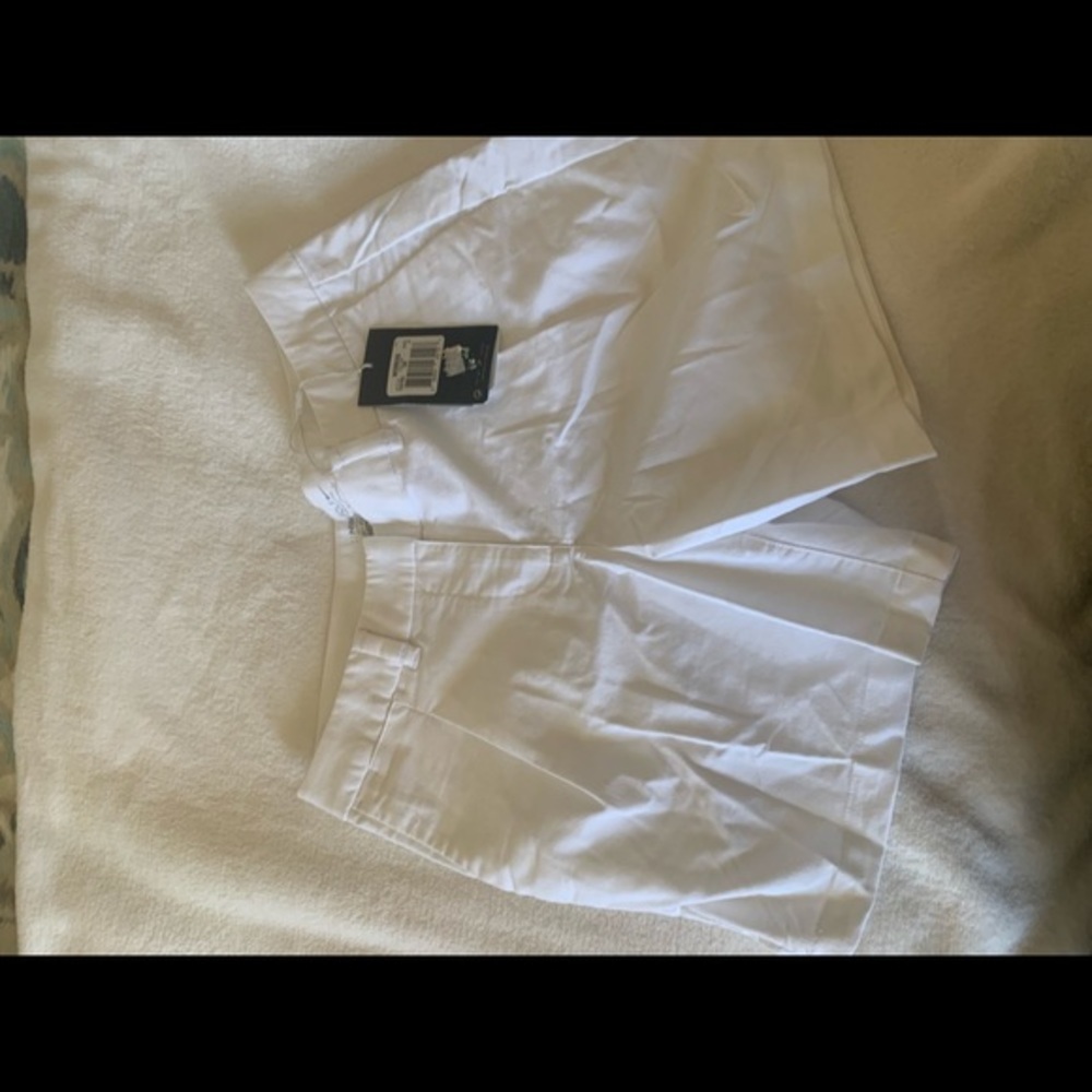 Nike golf shorts. New with tags   Size 4.